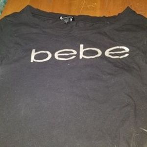 Bebe cropped short sleeve shirt.